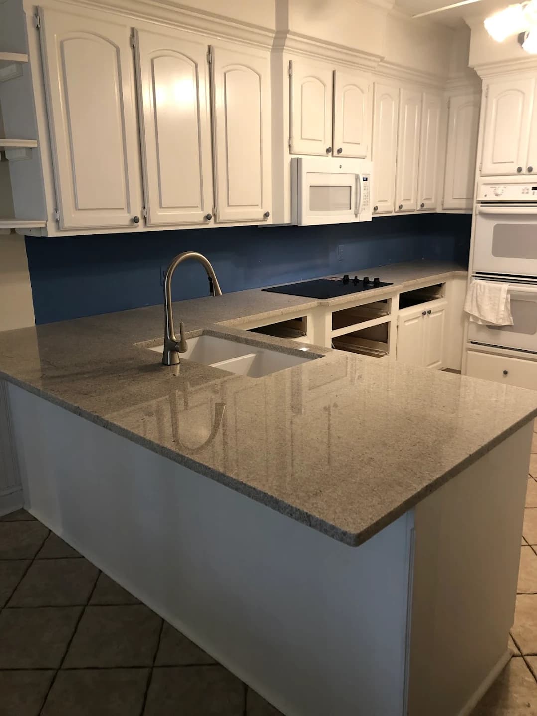 Forest Acres kitchen in Itanus White granite